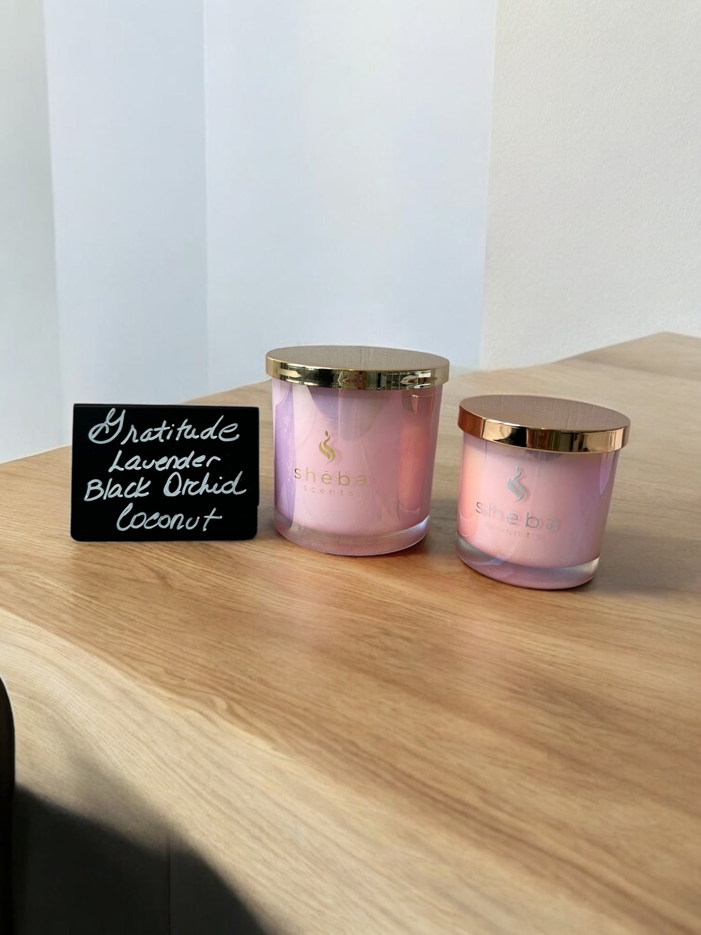 Choose between the 17 oz pink shimmer glass jar with gold metal lid or the 6 oz pink shimmer gratitude candle with a gold lid