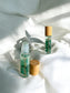 Close-up of Sheba Scents Heart Chakra Essential Oil Roll-On applying aromatherapy blend for chakra balancing, emotional support, and self-care rituals.
