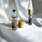 10ml clear bottle filled with amethyst crystals and amethyst roller ball for Crown Chakra balance and spiritual alignment